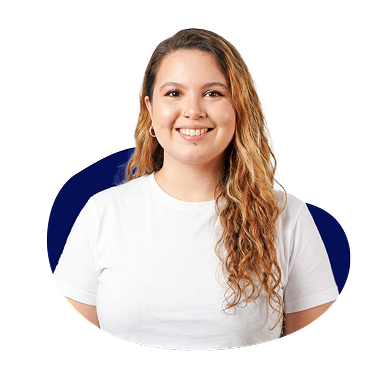 New Hampshire A woman with long wavy hair, wearing a white t-shirt, smiles at the camera against a simple blue and white background. Marketing Agency
