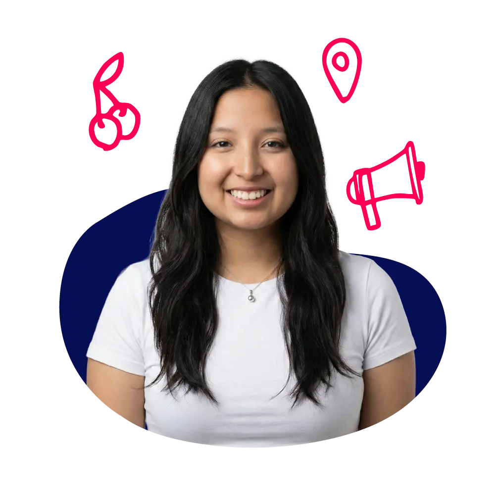 New Hampshire A woman with long dark hair wearing a white shirt smiles at the camera; red sketched icons of a cherry, location pin, and megaphone appear above her head. Marketing Agency