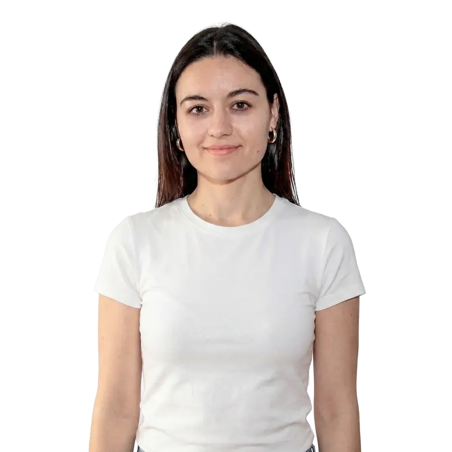 New Hampshire Woman with straight brown hair wearing a plain white t-shirt stands facing the camera against a transparent background. Marketing Agency